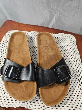 Black faux leather buckle strap slides. Size 40/9